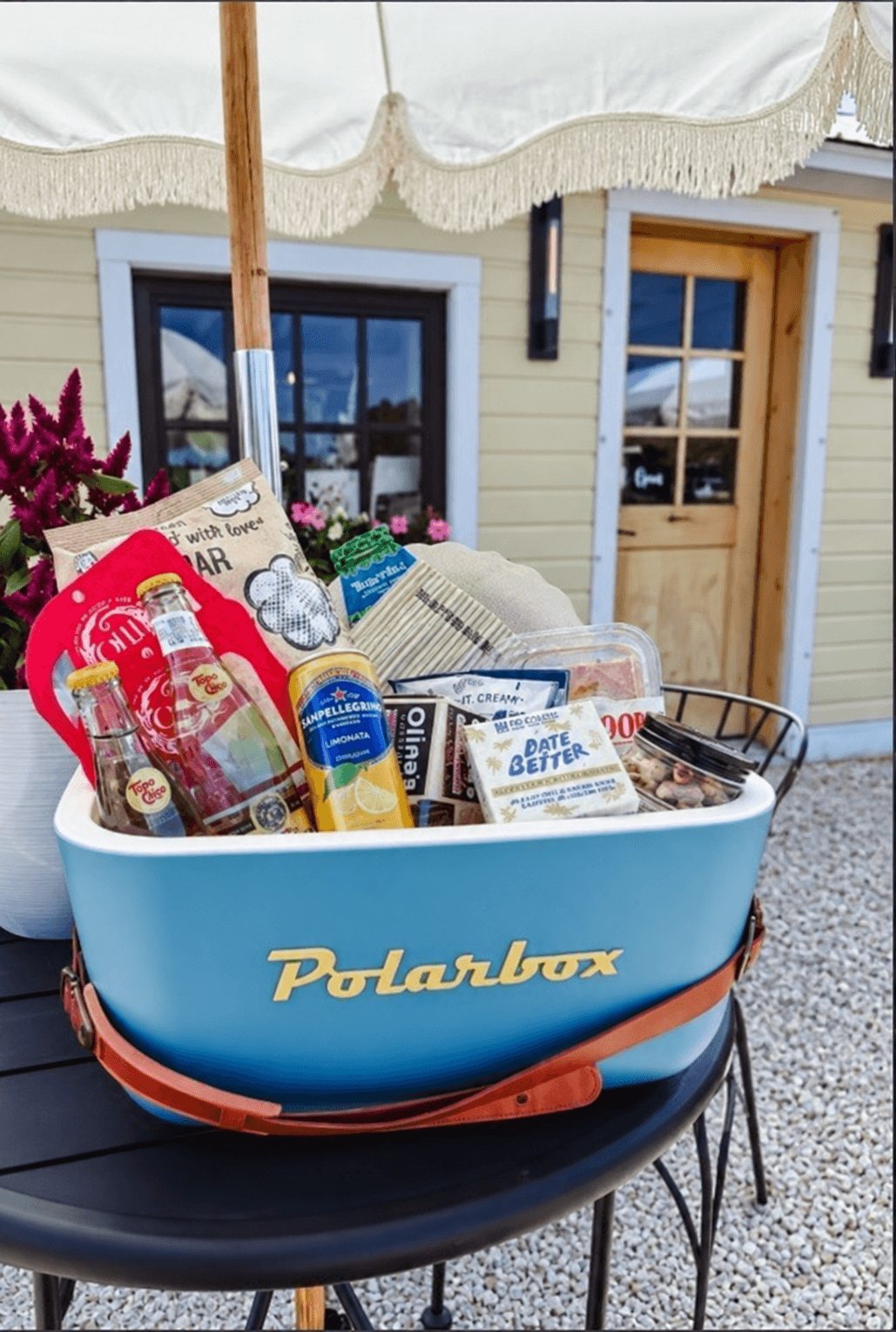 A Polarbox cooler filled with lake-day goods outside Golden Bell